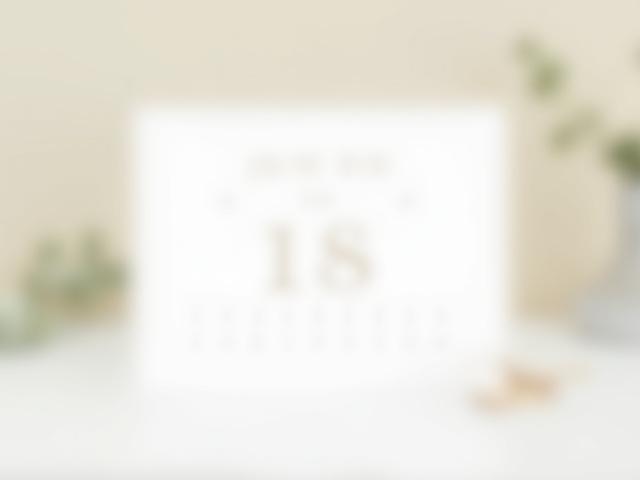 Modern save the date card with a minimalist calendar design highlighting the wedding date